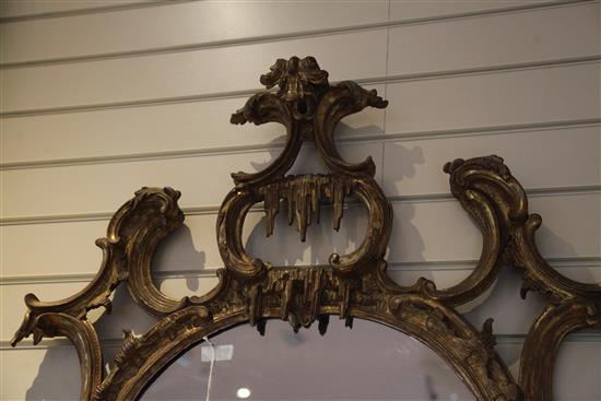 A fine George III Chippendale carved and giltwood wall mirror, H.3ft 11in. W.5ft 4in.